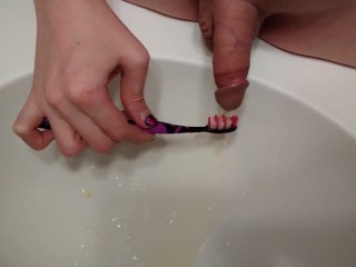 Trans chick brushes her teeth with her own piss